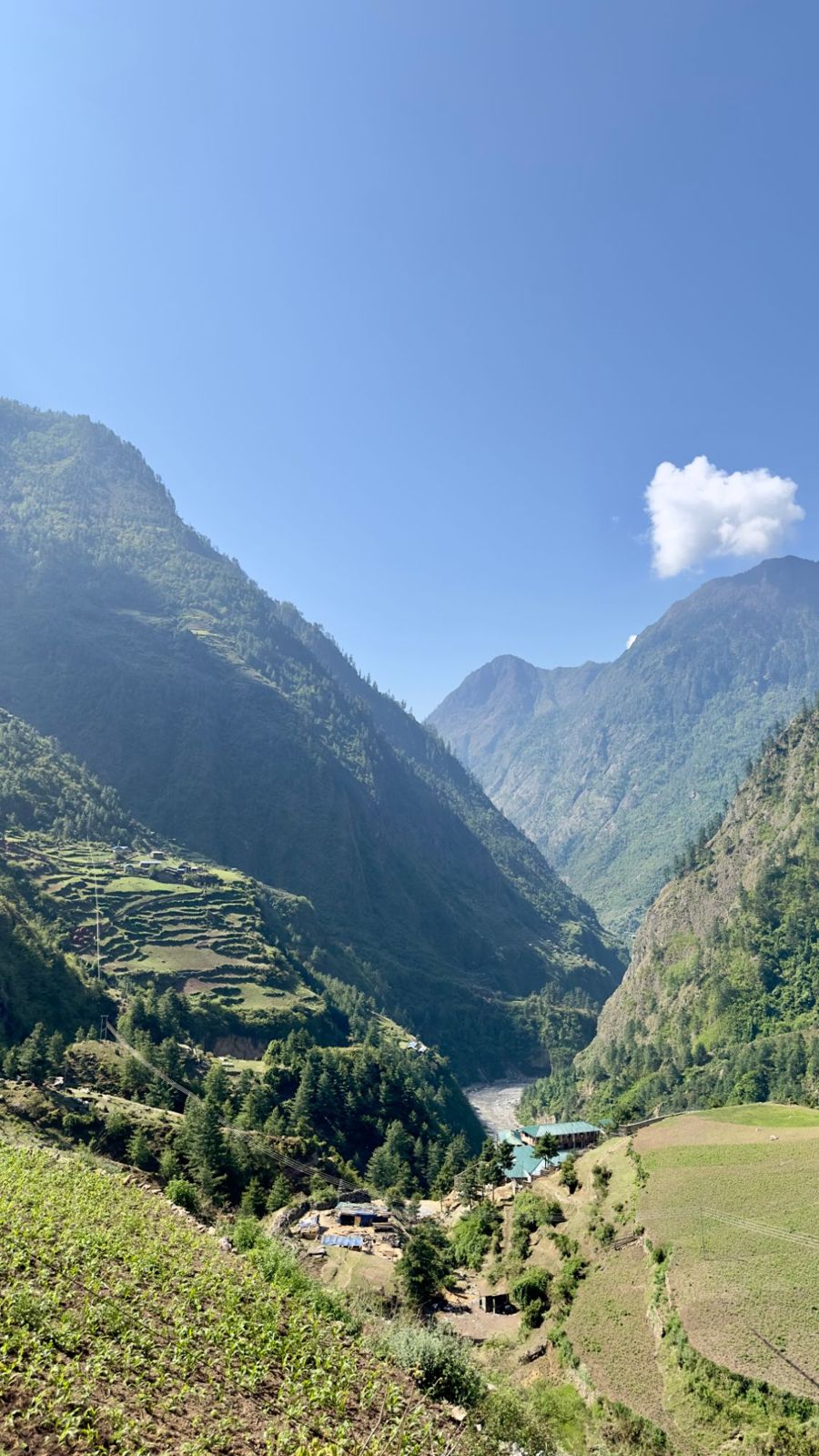 Terraced fields and a river valley on the Manaslu trail